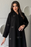 Sehrena Abaya featuring ribbon accents and intricate beadwork details.